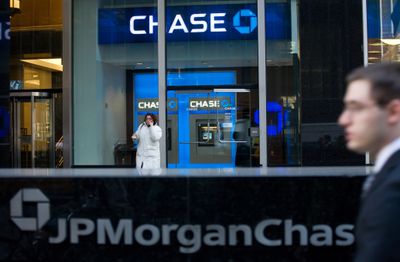 A customer leaves Chase Bank in New York. (File Associated Press / The Spokesman-Review)