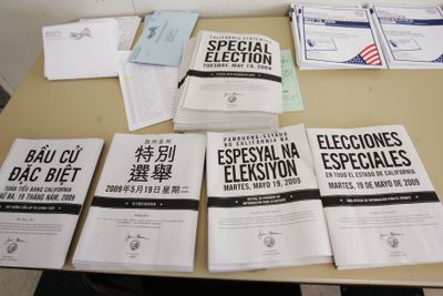 Pamphlets in a myriad of languages – English, Vietnamese, Chinese, Tagalog and Spanish – were on display for voters at a polling station in Palo Alto, Calif., on Tuesday.  (Associated Press / The Spokesman-Review)