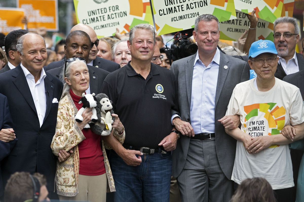From left, French Foreign Minister Laurent Fabius, primatologist Jane Goodall, former U.S. Vice President Al Gore, New York Mayor Bill de Blasio, and U.N. Secretary-General Ban Ki-moon participate in the People’s Climate March in New York on Sunday. (Associated Press)