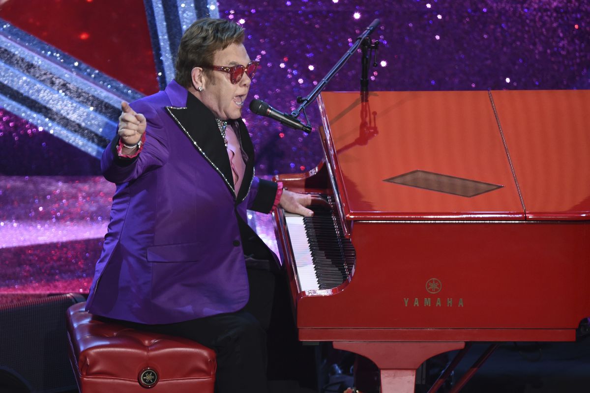 Elton John performs “(I’m Gonna) Love Me Again” at the Academy Awards in Los Angeles on Feb. 9. The song would later win an Oscar in the telecast. John’s eight-CD collection, “Elton: Jewel Box,” was released on Nov. 13.  (Chris Pizzello/Invision/AP)