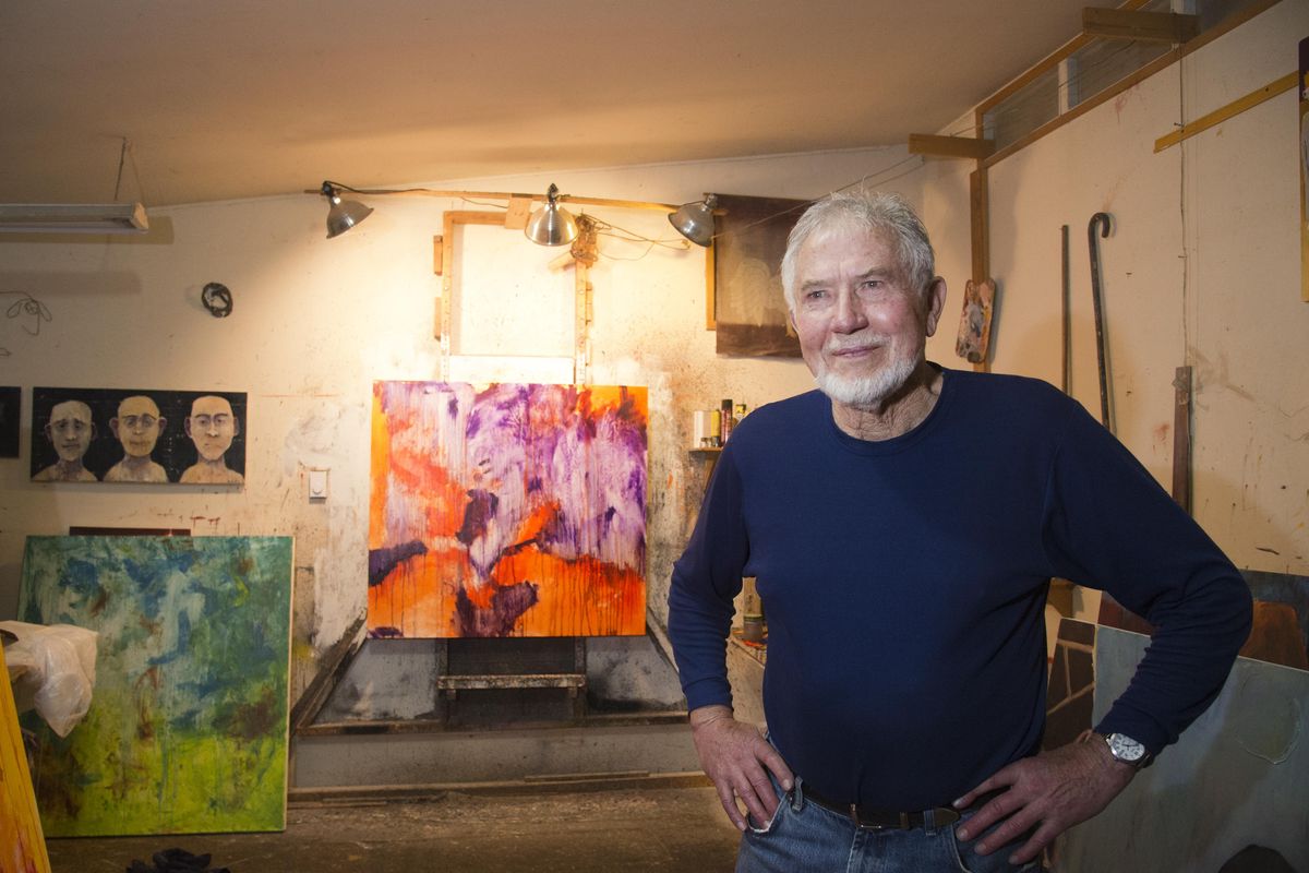 Artist Mel McCuddin stands in his art studio, Wednesday, Jan. 14, 2016, in Spokane Valley. McCuddin art has been called figurative expressionism. (Jesse Tinsley / The Spokesman-Review)