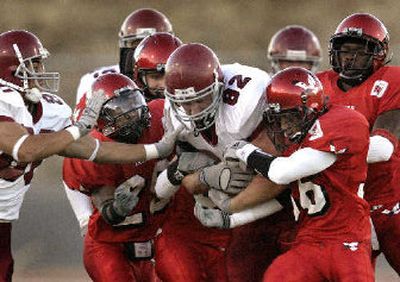 
Keith Grennan, who now plays for Eastern, was hard to bring down when he played for Central Washington. 
 (Associated Press / The Spokesman-Review)
