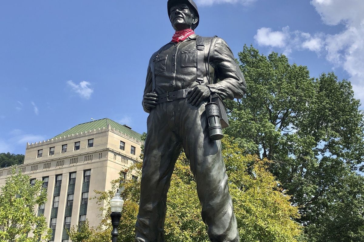 A statue of a coal miner is shown Aug. 26 at the West Virginia Capitol in Charleston, W.Va.  (John Raby)