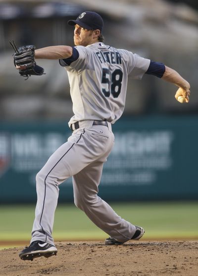 Seattle Mariners starting pitcher Doug Fister throws against the Los Angeles Angels on Thursday night. (Lori Shepler / Fr170037 Ap)