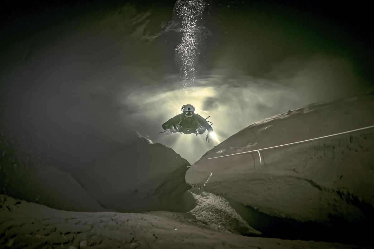 Natalie Gibb photographed diving partner Vincent Rouquette-Cathala in an underwater cave they found off the coast of Mexico. Diving in caves can be dangerous and gross. They have explored ones filled with a poisonous, smelly substance.  (Courtesy of Natalie Gibb)