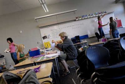 
The Spokesman-Review Parent Teacher Organization volunteers prepare a first-grade classroom Aug. 27 at the Prairie View Elementary School on Five Mile Prairie.
 (Brian Plonka / The Spokesman-Review)