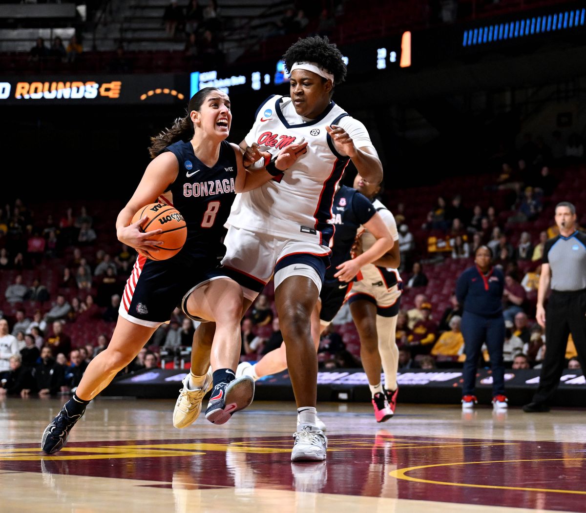 Gonzaga guard Ines Bettencourt (8) heads to the basket as Mississippi forward Christeen Iwuala (12) defends during an NCAA first-round tournament college basketball game Friday, March, 20, 2026, in Minneapolis.  (COLIN MULVANY/THE SPOKESMAN-REVIEW)