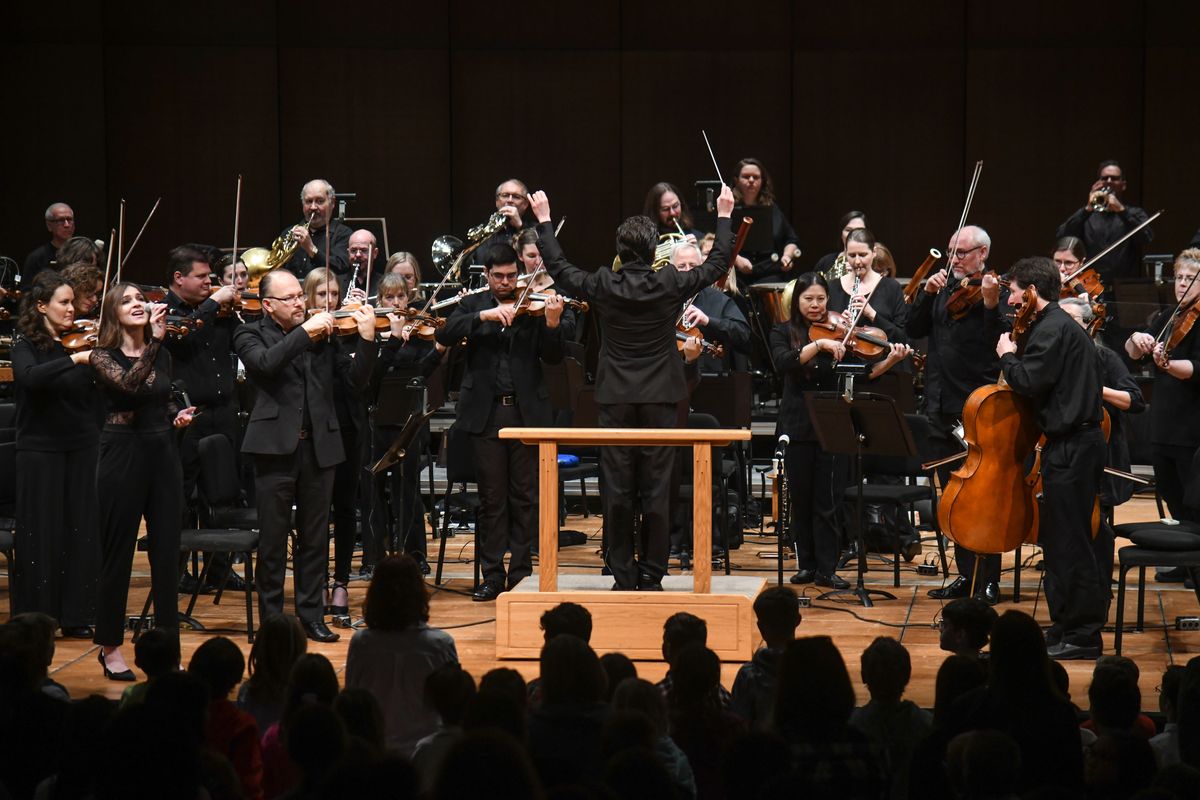 Spokane Symphony’s Jorge Luis Uzcåtegui conducts the national anthem during the Fourth and Fifth Grad concert Nov. 20, 2019, at the Martin Woldson Theater at the Fox.  (Dan Pelle/The Spokesman-Review)