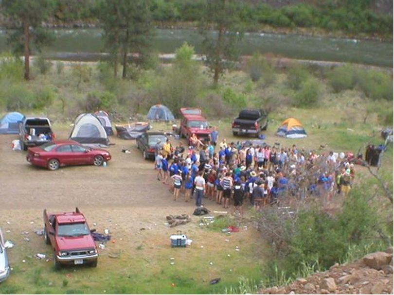 Washington Fish and Wildlife police reel in a beer party organized by a University of Idaho fraternity on the Grande Ronde River at the bottom of Schumaker Grade in May 2013. (Washington Fish and Wildlife Department)