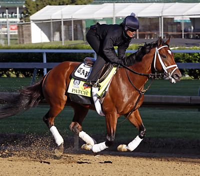 Exercise rider Isabelle Bourez puts Kentucky Derby hopeful Patch through his morning workout at Churchill Downs in Louisville, Ky., Tuesday, May 2, 2017. The 143rd running of the Kentucky Derby is Saturday, May 6. (Garry Jones / Associated Press)