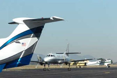 
A turboprop aircraft pulls up at the Coeur d'Alene Airport on Tuesday.  The use of private, corporate or fractionally-owned turboprop and jet airplanes increased after 9/11 and they are a common sight at regional airports. 
 (Jesse Tinsley / The Spokesman-Review)