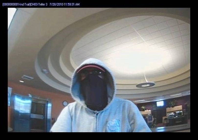 This security image shows a man who robbed the STCU Indian Trail branch about noon on Wednesday, July 28, 2010. (Courtesy of STCU)