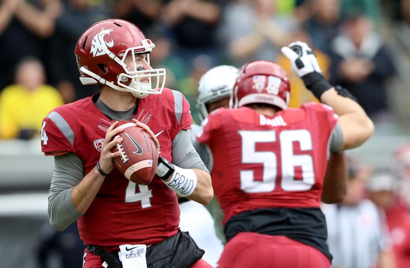 Washington State quarterback Luke Falk leads the Cougars against Eastern Washington in the teams’ season opener Saturday in Pullman. (Ryan Kang / Associated Press)