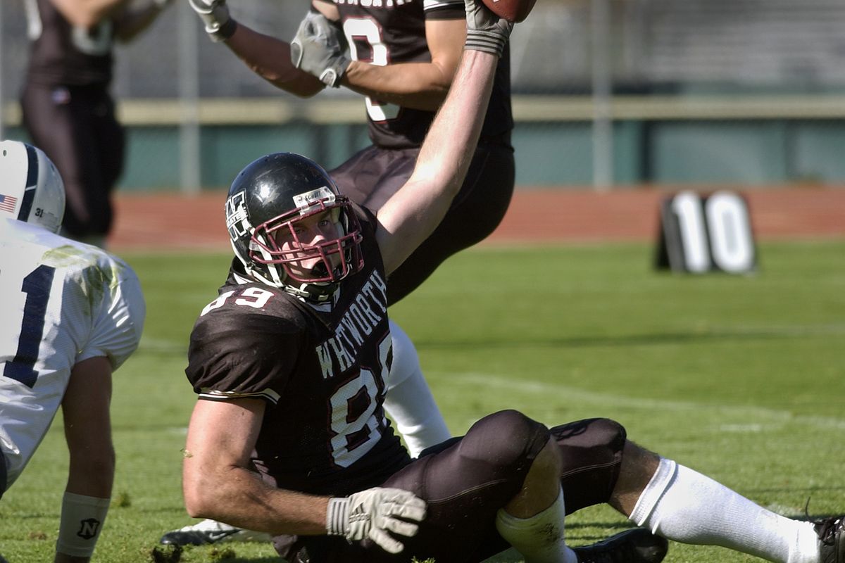 Then: Whitworth tight end Michael Allan shows the Pine Bowl crowd a pass he caught against Menlo near the goal line on Oct. 22, 2005. (Dan Pelle)