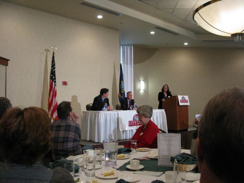 Raul Labrador, left, and Walt Minnick, center, debate in Boise on Thursday; at right is Boise City Club moderator Marcia Franklin (Betsy Russell)