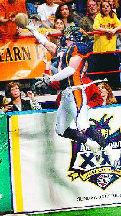 Spokane's Rob Keefe, who had two interceptions, comes up just short.
(Ingrid Lindemann / The Spokesman-Review)
