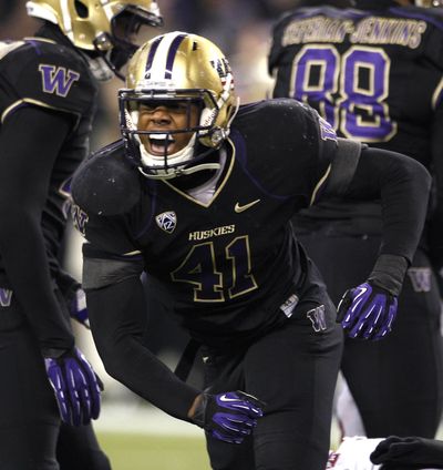 Travis Feeney and the defense played a key role in Washington’s 34-15 win over Utah last Saturday. (Associated Press)
