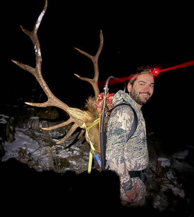 Tyler Tjomsland, of Tumtum, packs out a bull elk he harvested in Idaho in October 2024. Non-resident hunters have until June 5 to submit controlled hunt permit requests.  (Thomas Clouse/The Spokesman-Review)