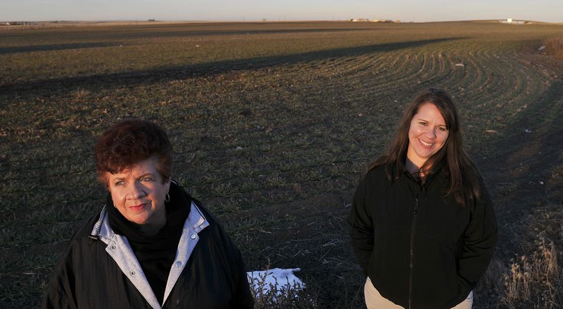Ritzville Mayor Linda Kadlec, left, and city clerk Kris Robbins, who’s also a member of the Ritzville Public Development Authority, are among proponents of a plan to build a small roadside wheat farm connected to a museum, shopping complex and visitors center. (Jesse Tinsley)