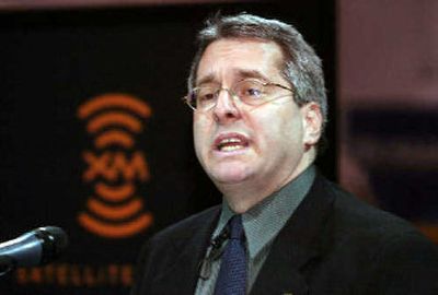 
XM Satellite Radio President and Chief Executive Officer Hugh Panero speaks during a news conference at the Consumer Electronics Show. At the same time, a key director quit over disagreements about the company's direction, warning of a looming 