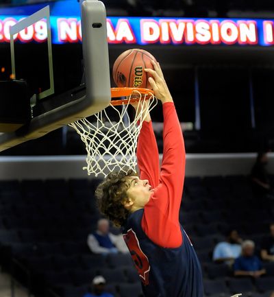 Gonzaga’s Matt Bouldin completes a reverse jam during Thursday’s practice session before tonight’s Sweet 16 game.  (Christopher Anderson / The Spokesman-Review)