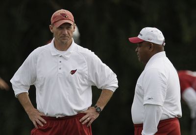 Associated Press In Ken Whisenhunt, left, Arizona Cardinals general manager Rod Graves, right, found what he wanted in a head coach. (Associated Press / The Spokesman-Review)