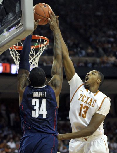 Texas’ Tristan Thompson blocks shot of UConn’s Alex Oriakhi. (Associated Press)