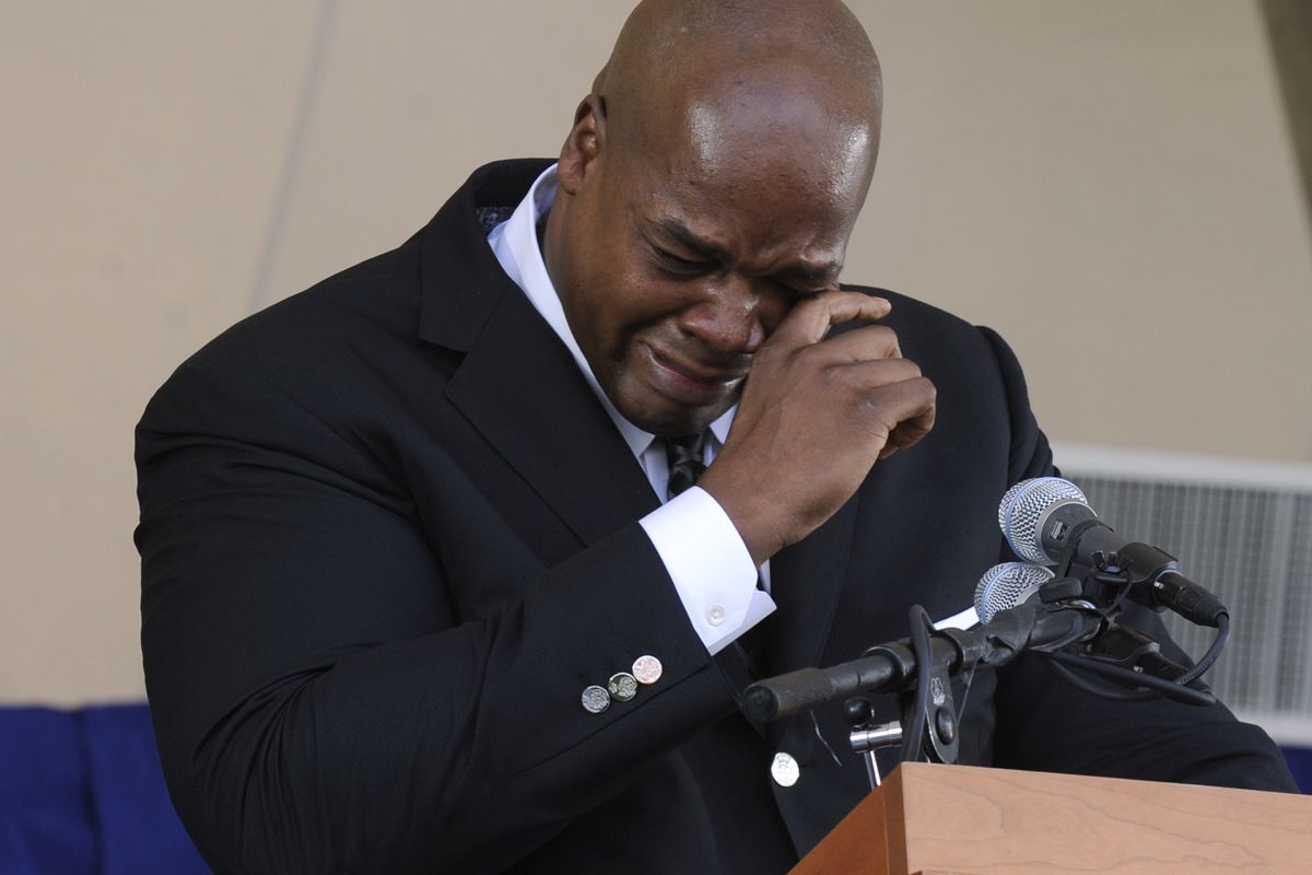 Frank Thomas wipes away tears as he speaks during the induction ceremony. (Associated Press)