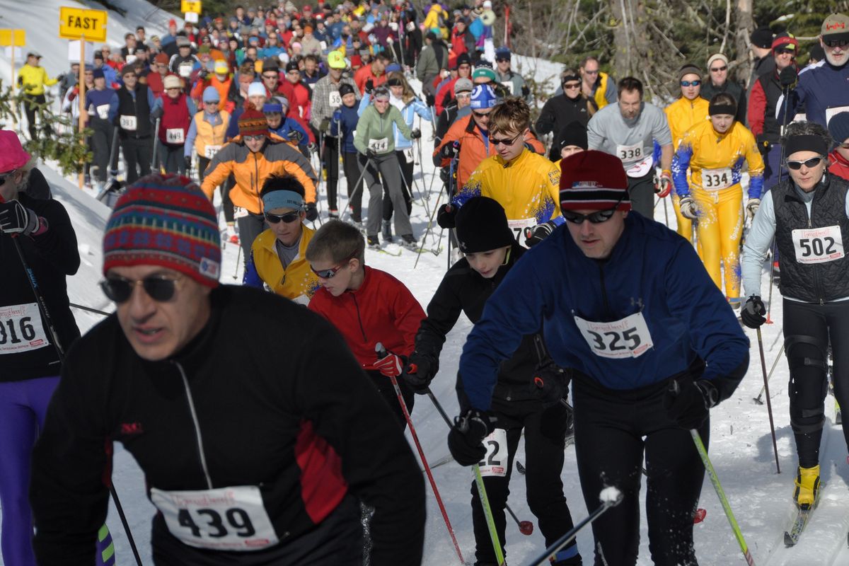 Skiers of all sizes and ages enter Langlauf. (Rich Landers)