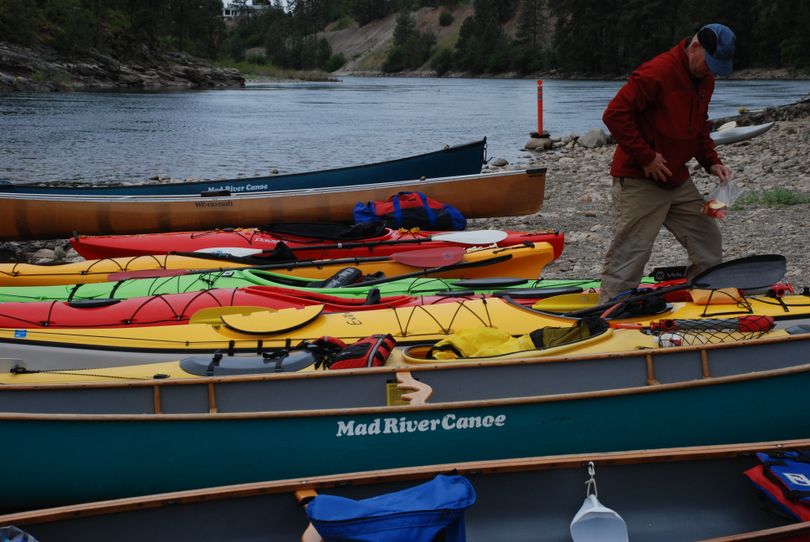 Boats of all descriptions are on the beach at Corbin Park in Post Falls ready for the start of Sunday's Spokane River Canoe Classic. (Rich Landers / The Spokesman-Review)