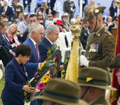 Australian Prime Minister Malcolm Turnbull, second from left, Israeli Prime Minister Benjamin Netanyahu, third from left, and The New Zealand Governor General Patsy Reddy, left, lay wreaths at the memorial for the fallen in the Battle of Beersheba during a ceremony marking the 100th anniversary of the battle held in the British Military Cemetery in Beersheba, Israel, Israel, Tuesday, Oct. 31, 2017. (Jim Hollander / Associated Press)