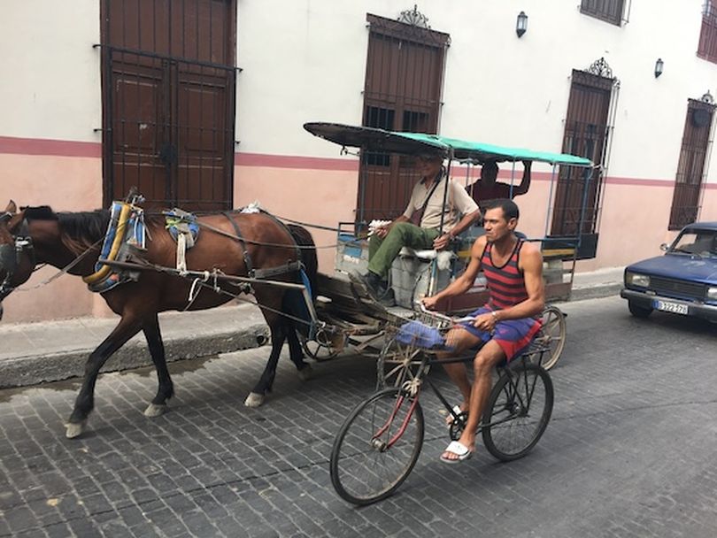 Whether by horse, bicycle or car, Cuban traffic is an intriguing enterprise. (Dan Webster)