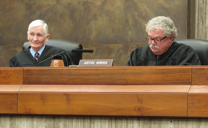 Chief Justice Jim Jones, left, and Justice Roger Burdick, right, listen to arguments in a recent case at the Idaho Supreme Court in Boise (Betsy Z. Russell)