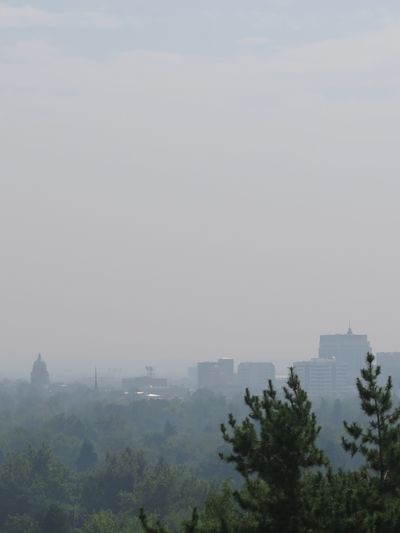 Things are looking a bit brighter in Boise on Friday afternoon, Sept. 8, 2017, but the skyline still is shrouded in smoke. A statewide air quality alert was lifted Friday morning due to improvements in eastern Idaho, but much of the state still is under a heavy pall from wildfire smoke, and regional restrictions on open burning remain in effect. (Betsy Z. Russell)
