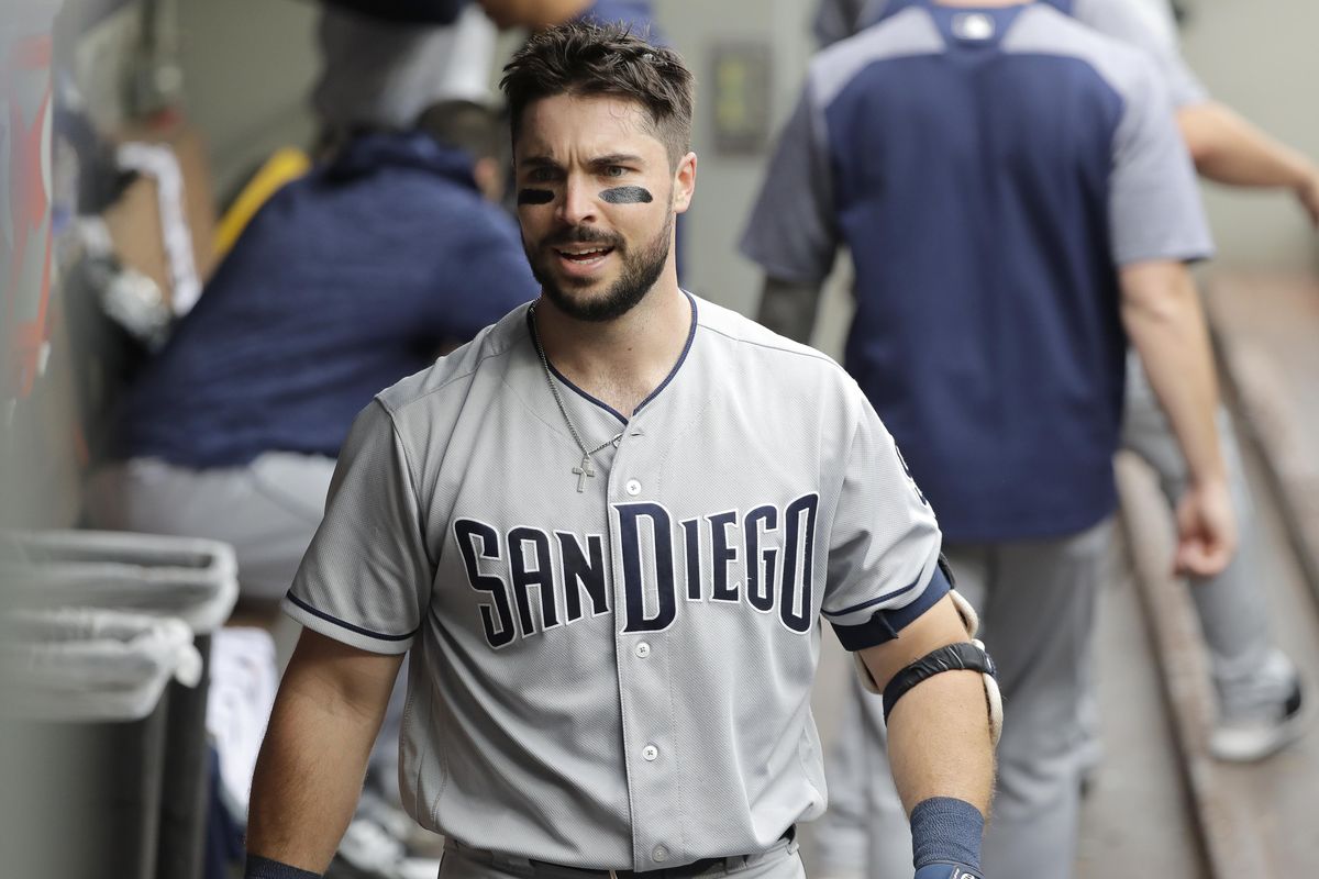 San Diego Padres' Austin Hedges walks in the dugout after he hit a two-run home run to score Eric Hosmer during the second inning of a baseball game against the Seattle Mariners, Wednesday, Sept. 12, 2018, in Seattle. (Ted S. Warren / AP)