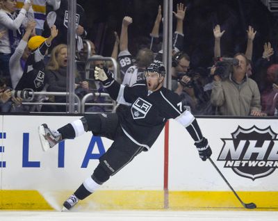 Kings center Jeff Carter celebrates a first-period goal, giving Los Angeles an early 1-0 lead. (Associated Press)