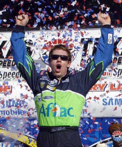 
Carl Edwards celebrates victory in Samsung 500 on Sunday. Associated Press
 (Associated Press / The Spokesman-Review)