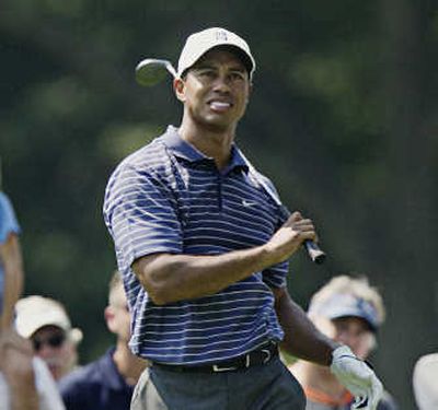 Tiger Woods said Firestone Country Club toughens up his game. Associated Press
(Associated Press / The Spokesman-Review)