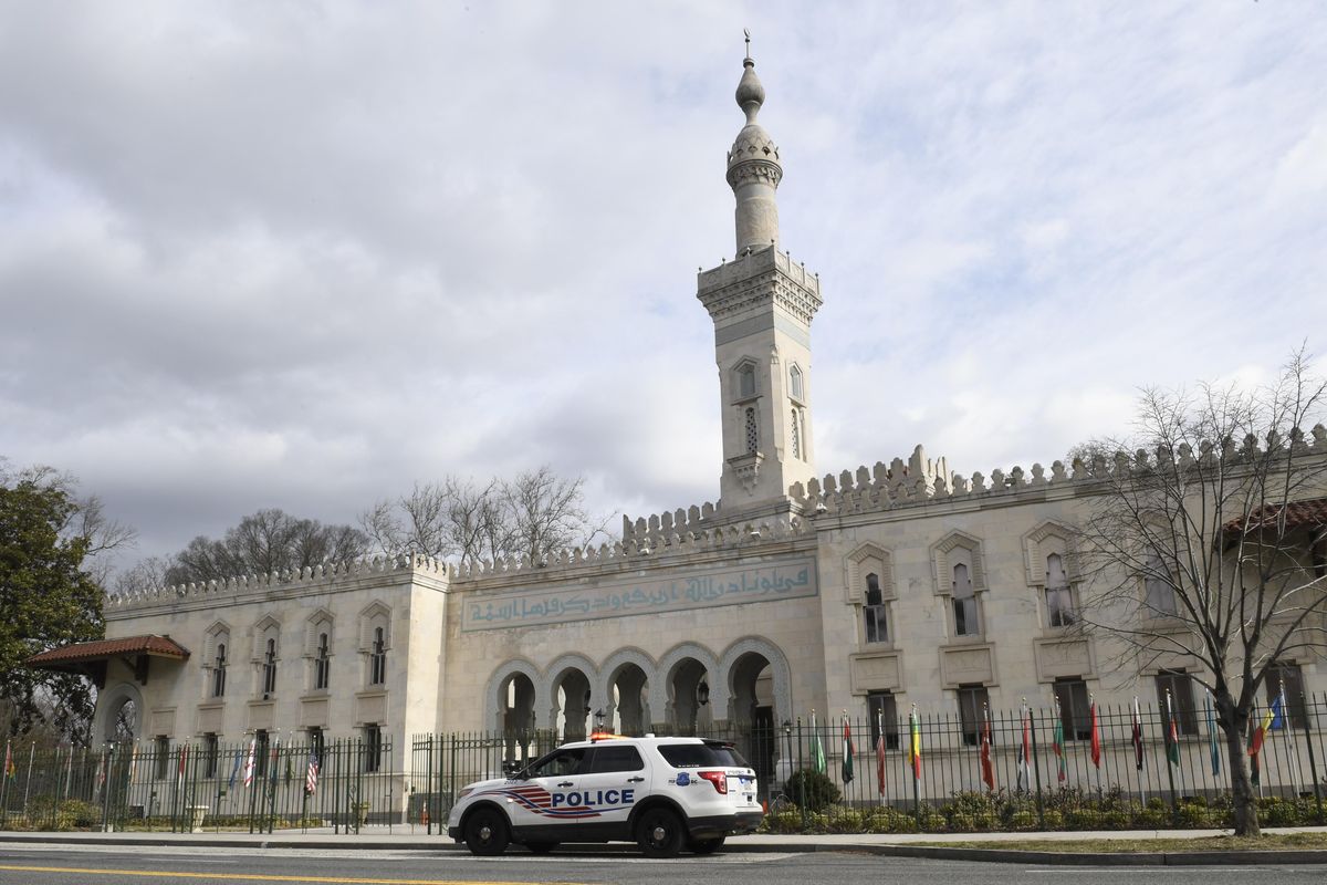 A police vehicle is parked outside the Islamic Center of Washington, Friday, March 15, 2019 in Washington. (Susan Walsh / Associated Press)