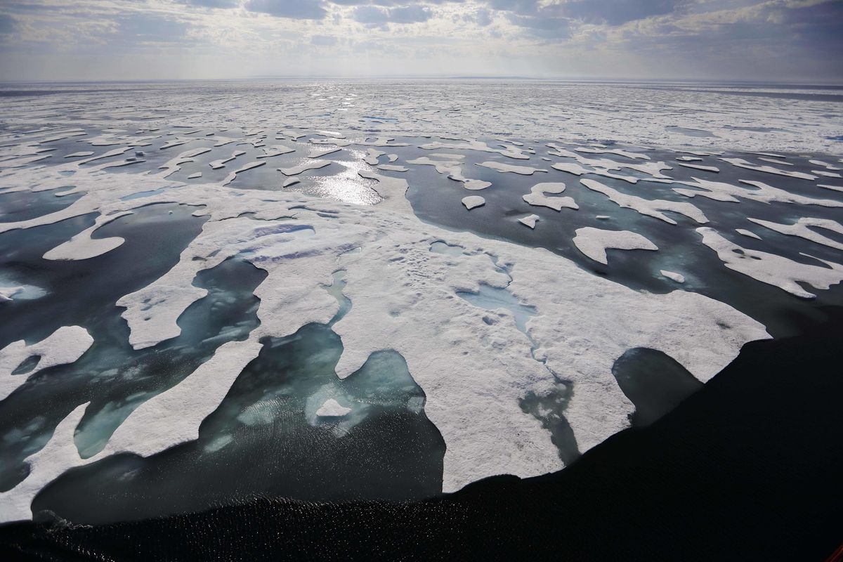 Sea ice melts on the Franklin Strait along the Northwest Passage in the Canadian Arctic Archipelago, on Saturday, July 22, 2017. Because of climate change, more sea ice is being lost each summer than is being replenished in winters. Less sea ice coverage also means that less sunlight will be reflected off the surface of the ocean in a process known as the albedo effect. The oceans will absorb more heat, further fueling global warming. (David Goldman / AP)