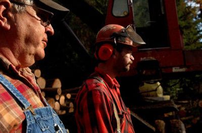
Kermit Kiebert, left, and Travis Kiebert survey their logging site near Hope, Idaho. 