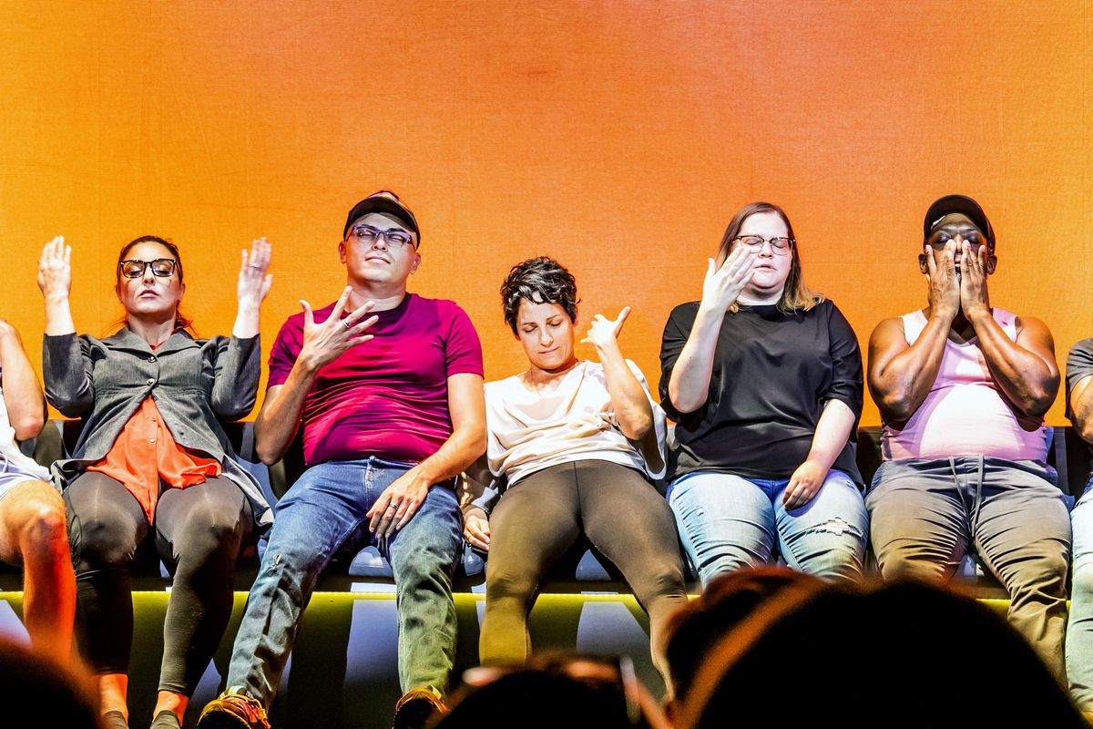 Volunteers undergo hypnosis onstage at "Hyprov" in New York on Thursday, Aug. 11, 2022. The show is the brainchild of Asad Mecci and Colin Mochrie. (Krista Schlueter/The New York Times) (KRISTA SCHLUETER)