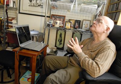 “I’ve been writing a good part of my life,” poet Merle “Mel” Martin said, as he sat in his Spokane Valley study where he composed much of his recently published book, “The Haunting: Poetic Images of Alaska.”  (J. BART RAYNIAK / The Spokesman-Review)