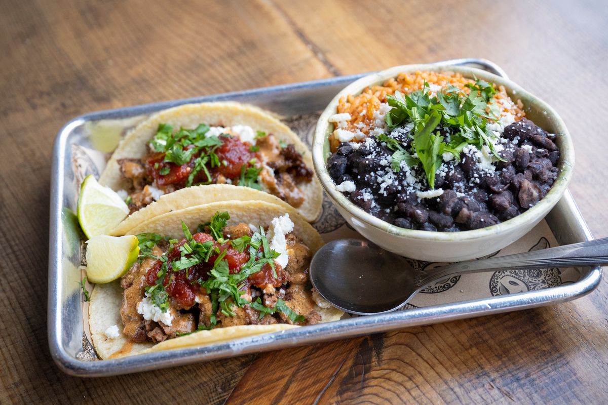 Durkin’s Liquor Bar chef Jarrott Moonitz loves the Lamb Merguez Tacos at Cochinito Taqueria, shown Thursday. The dish features corn tortillas with North African lamb sausage, hazelnut salsa macha, queso fresco, tomato and mint chutney. (Jesse Tinsley/The Spokesman-Review)
