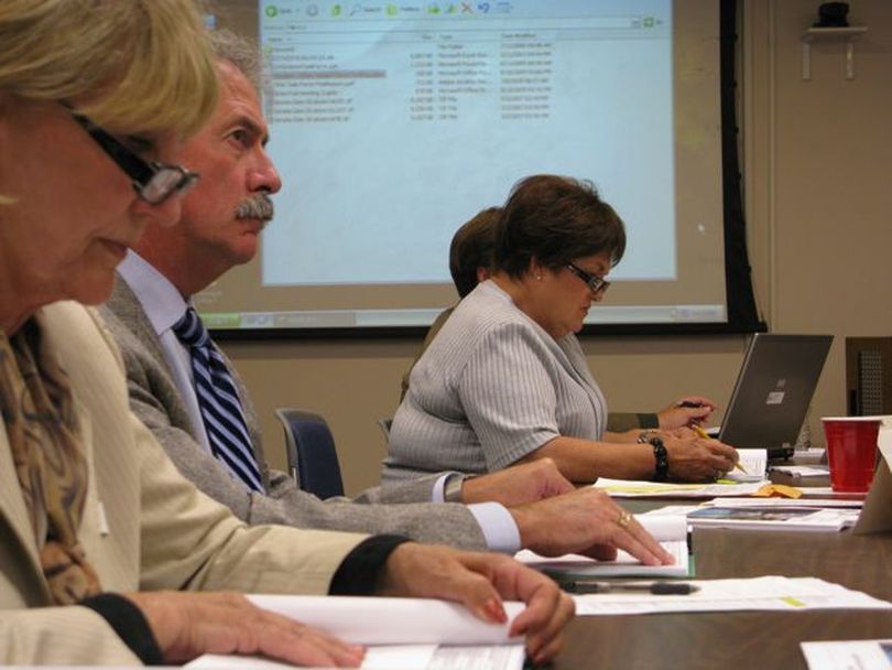 Sen. Jim Hammond, R-Post Falls, second from left, listens to options for funding Idaho State Police and state parks when they lose gas tax funding next year. At left is Sen. Diane Bilyeu, D-Pocatello; at right is Sen. Patti Anne Lodge, R-Huston. (Betsy Russell / The Spokesman-Review)