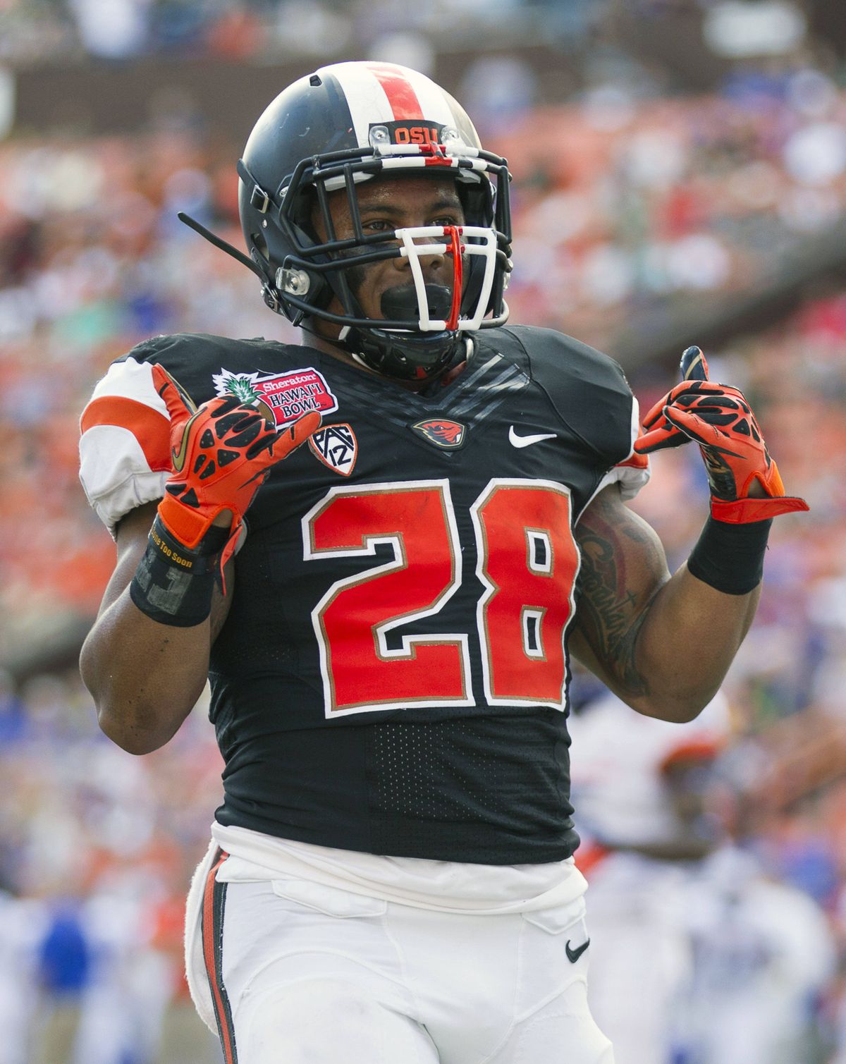 Oregon State running back Terron Ward celebrates after his second-quarter touchdown Tuesday in the Hawaii Bowl. (Associated Press)