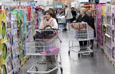 Shoppers push their carts through the toy aisles at the Costco in Cranberry, Pa., Butler County. With holiday sales shaping up to be the lowest in years, shoppers may be finding some great deals after Christmas.  (File Associated Press / The Spokesman-Review)