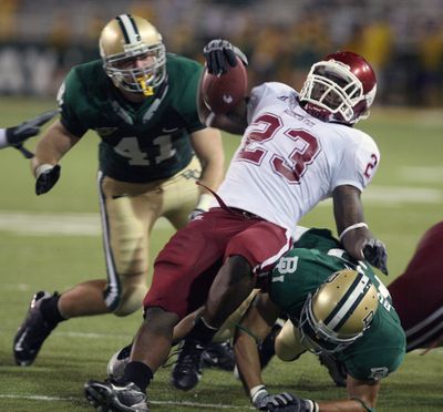 Chris Ivory, being brought down in a 2008 game against Baylor, rushed for 534 yards in three seasons at WSU. (File Associated Press / The Spokesman-Review)
