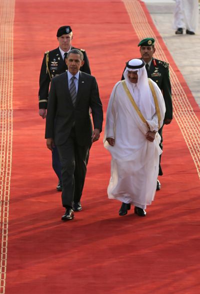 President Barack Obama is welcomed by Governor of Riyadh Prince Khalid Bandar bin Abdul-Aziz Al-Saud on arriving in Riyadh, Saudi Arabia, on Friday. (Associated Press)