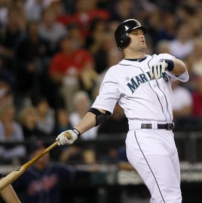 Russell Branyan of the Mariners uncorks a two-run home run in the third inning of Thursday night’s loss. (Associated Press)